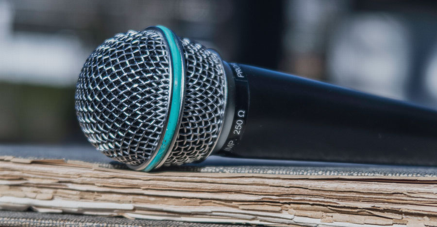 microphone on a stack of books
